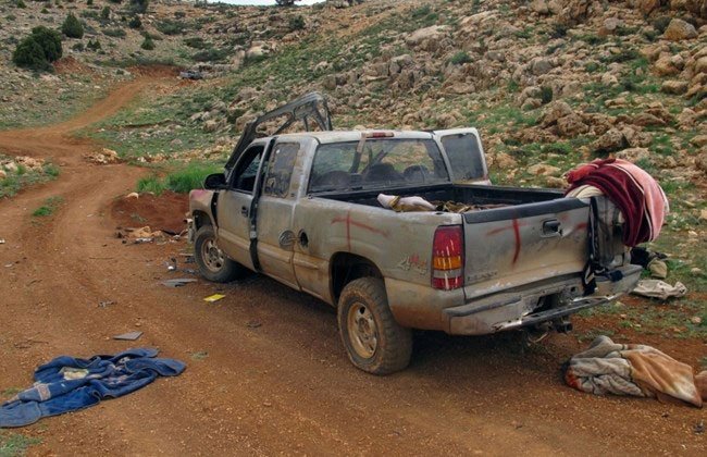 5-11-15_assal_ward_damaged_car